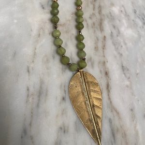 Beautiful semi precious beaded necklace with brass leaf pendant